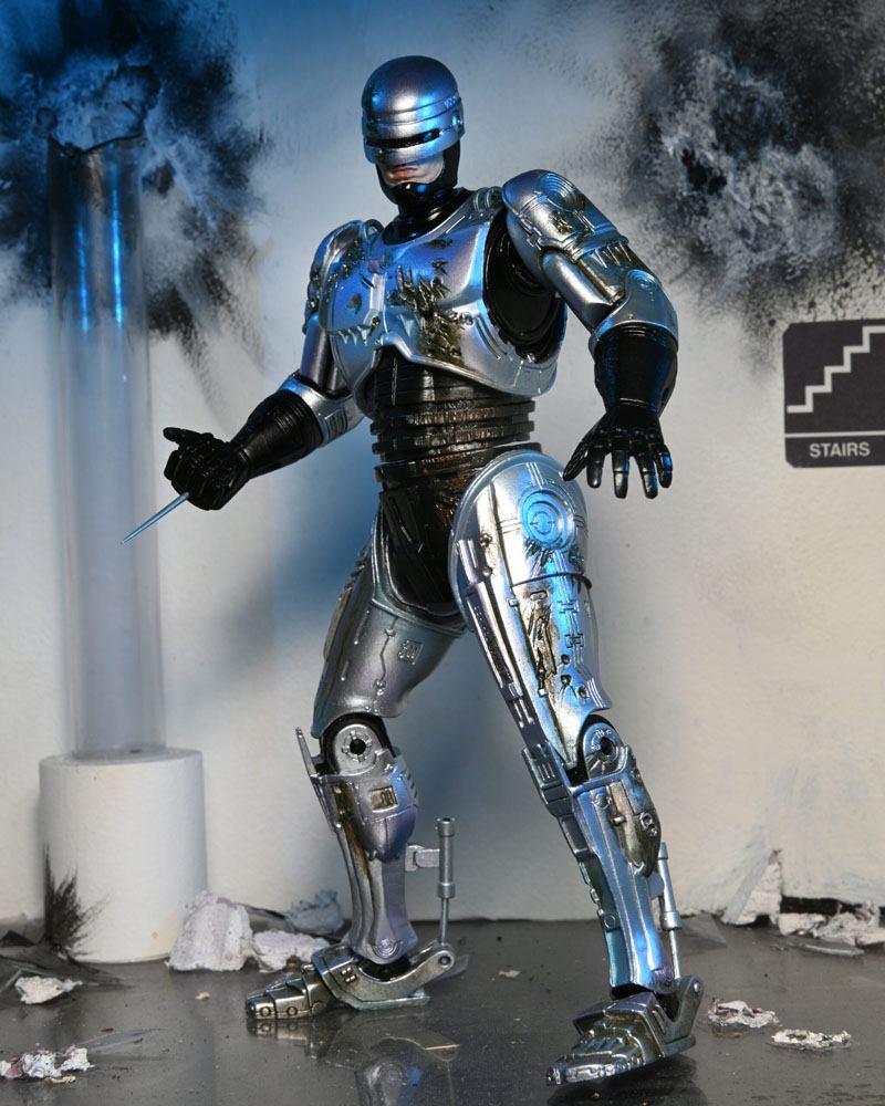 RoboCop Action Figure Ultimate Battle Damaged RoboCop with Chair 18 cm - Toys - NECA